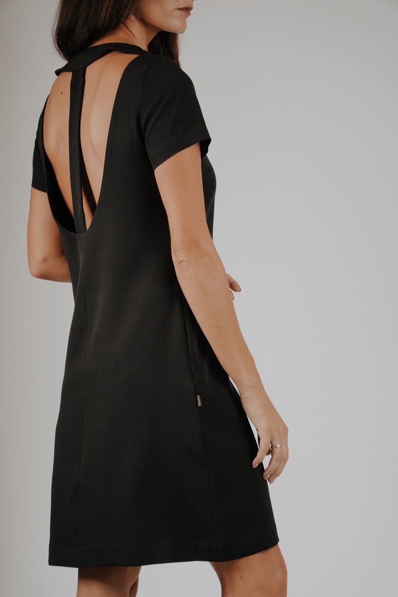 Black mini dress with pockets and open back, Little black dress, KRIKL, Made in Latvia image 1