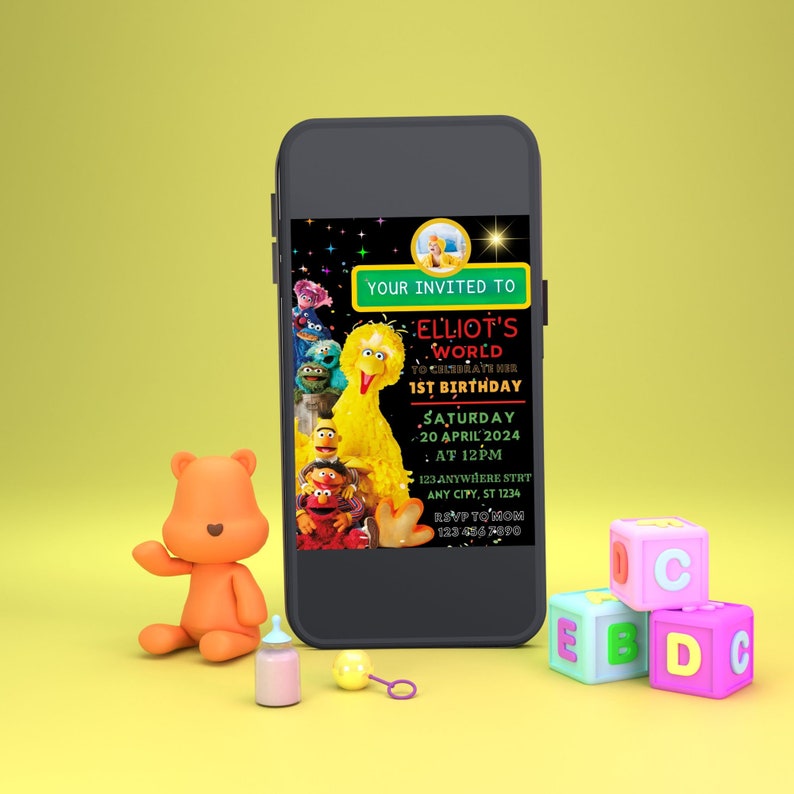 May include: A digital invitation for a 1st birthday party featuring Sesame Street characters. The invitation is on a smartphone screen with a yellow Big Bird character in the center. The text reads "YOUR INVITED TO ELLIOT'S WORLD TO CELEBRATE HIS 1ST BIRTHDAY SATURDAY 20 APRIL 2024 AT 12PM 123 ANYWHERE STRT ANY CITY, ST 1234 RSVP TO MOM 1234567890".