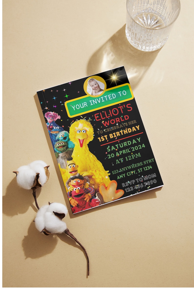 May include: A Sesame Street themed birthday invitation with a photo of a baby in a yellow circle. The invitation is for Elliot's 1st birthday party. The text on the invitation reads "Your Invited To Elliot's World To Celebrate Her 1st Birthday Saturday 20 April 2024 At 12PM 123 Anywhere Strt Any City, St 1234 RSVP To Mom 123 456 7890".