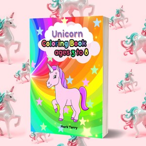Puede incluir: Un libro para colorear de unicornios para ni&ntilde;os de 3 a 8 a&ntilde;os, con una ilustraci&oacute;n de un unicornio rosa sobre un fondo de arco&iacute;ris. El libro est&aacute; rodeado de figuras de unicornios blancos con crines azules y rosas, sobre un fondo rosa.