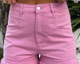 Shorts vaqueros de talle medio con borde deshilachado en rosa