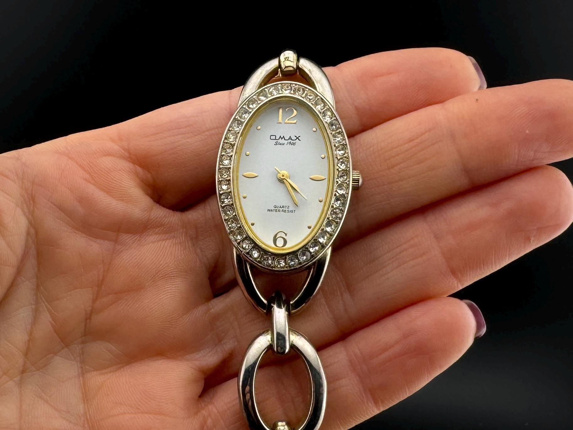 Q max quartz watch price clearance
