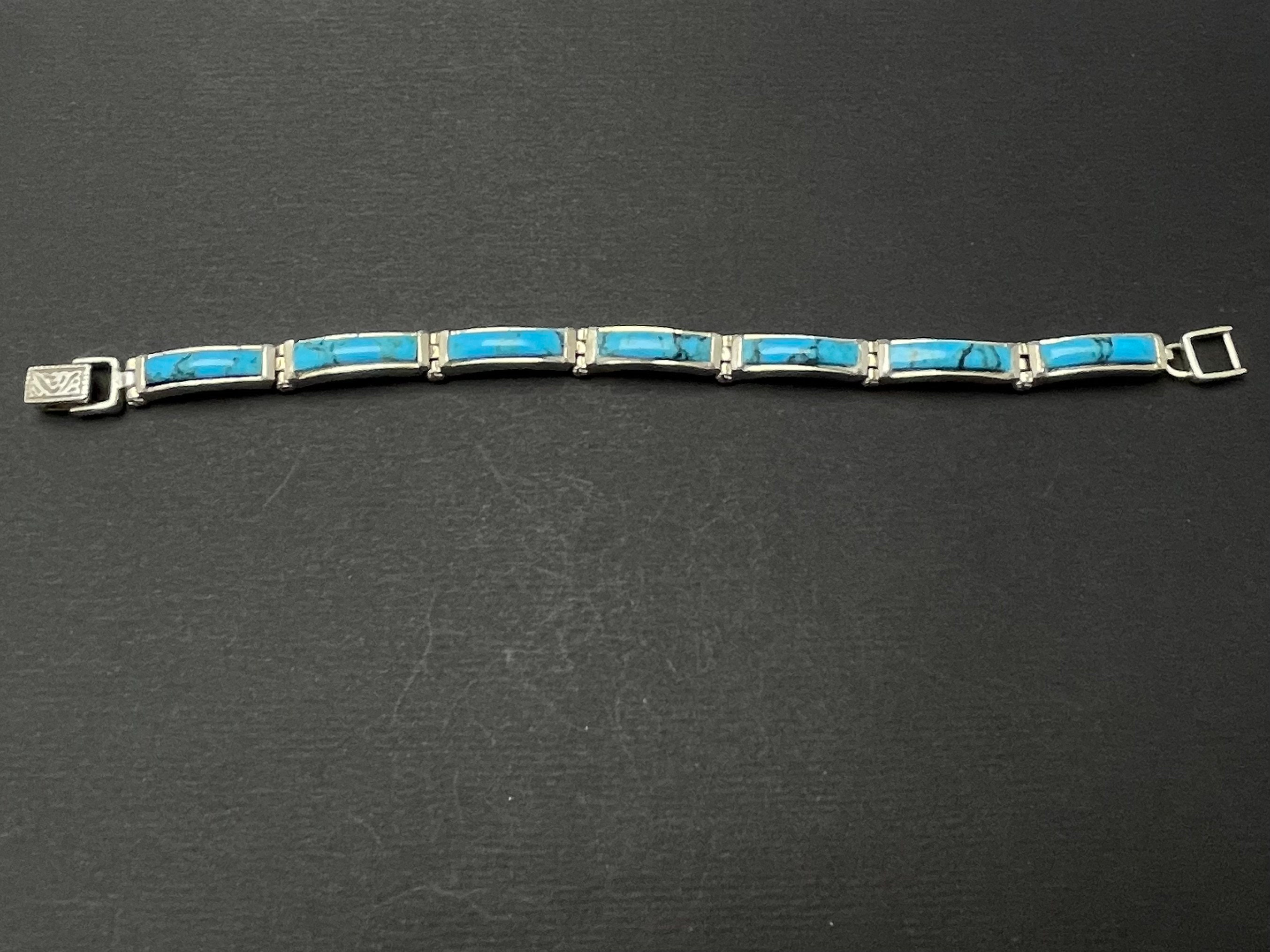 Bracelet En Argent Rail De Pierres Bleues Circa 1925 - Style Jonc - Occasion (strass Manquants)