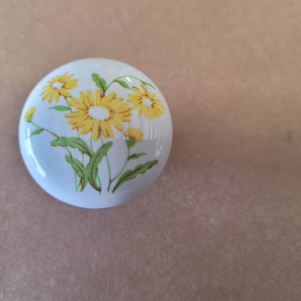 vintage round white porcelain knobs with yellow and white flower design