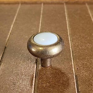 1 In Knob With Brass and white porcelain center NOS kitchen Bath Cabinet Drawers
