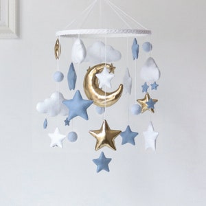Giostrina per neonato con stelle dorate Giostrina per bambina con stelle blu Giostrina per cameretta dorata con nuvole bianche Decorazioni per la cameretta dei bambini Giostrina per cameretta con stelle blu e nuvole per neonato