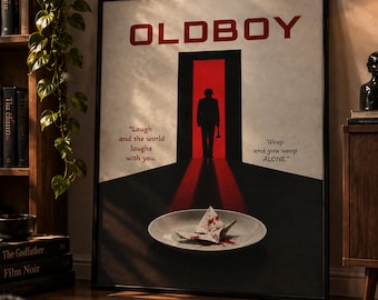 May include: A framed movie poster for Oldboy featuring a silhouette of a person holding a hammer in a red doorway. The text reads: Laugh and the world laughs with you. Weep and you weep ALONE. A white plate with a blood-stained paper sits below.