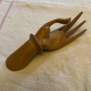 Vintage wood carved hand.