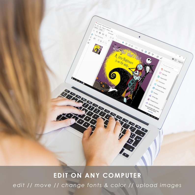 May include: A laptop displaying a digital image with the text "A Little Nightmare is on the way..." and illustrations of characters against a yellow moon and purple background. The laptop screen is open, and the keyboard is visible.
