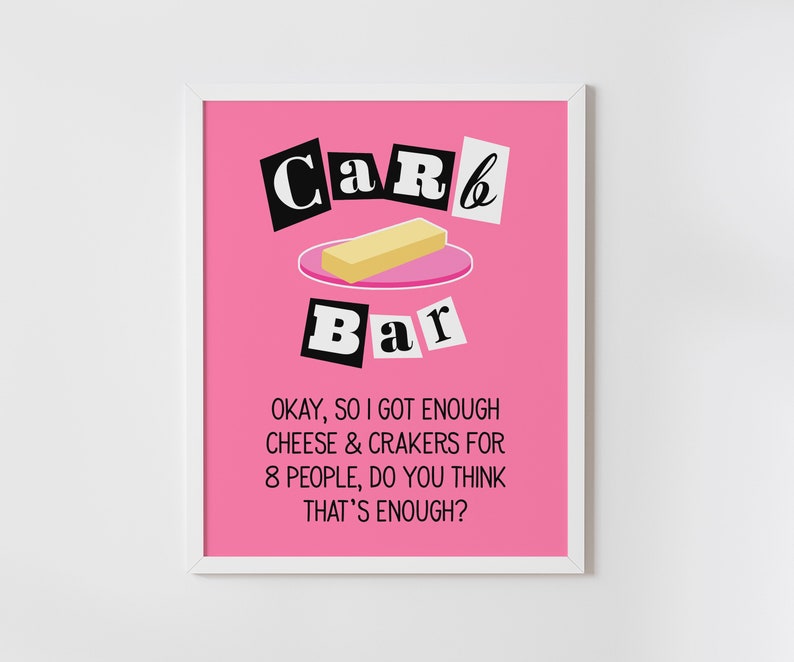 May include: A pink and white framed print with the text "CaR6 Bar" in black block letters. The print features a stick of butter on a pink plate. The text below the image reads "OKAY, SO I GOT ENOUGH CHEESE & CRAKERS FOR 8 PEOPLE, DO YOU THINK THAT'S ENOUGH?"
