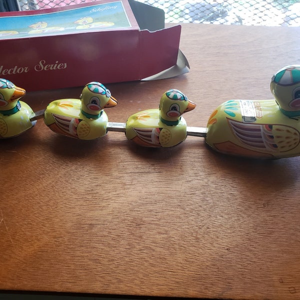 Schylling Duck Family Wind-Up Mama Duck Pulls "Bobbing" Ducklings Around Replica Tin Toy