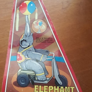 Schylling Elephant On Bike Tin Toy New Reproduction