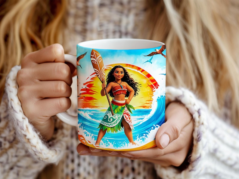 May include: A white ceramic mug with a colorful image of a woman with long brown hair holding a paddle. The image is set against a background of a sunset over the ocean with waves and birds flying.