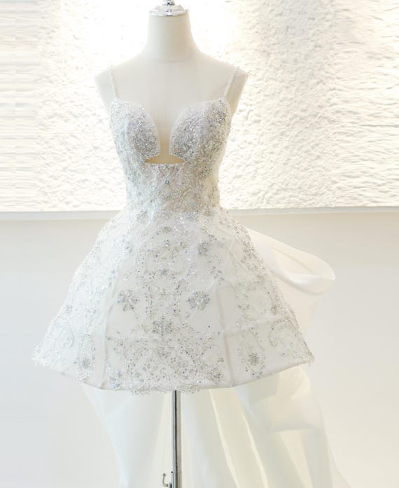 white beaded short prom dresses Sparkly White A Line Ruffled Short Beaded Homecoming Dress with Bows, White