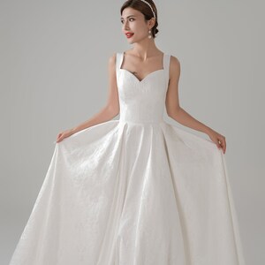 Vestido de novia de satén con relieve jacquard marfil, tirantes y bolsillos, vestido de novia personalizado, vestido moderno con cintura natural preordenada. imagen 9