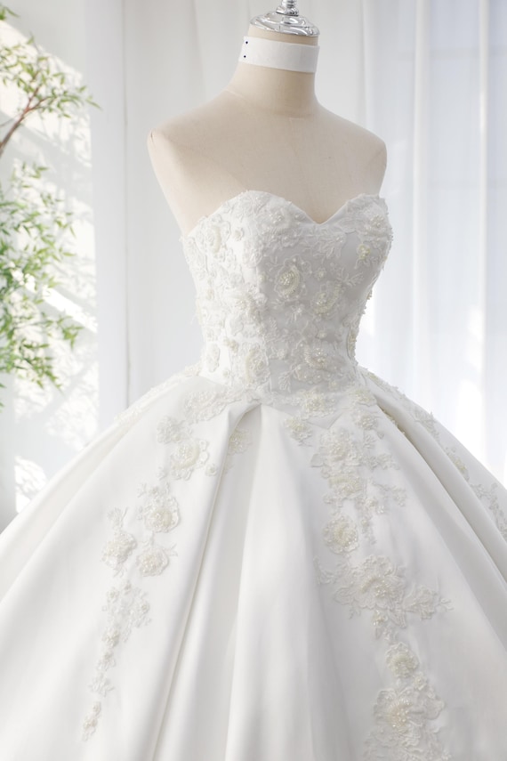 Strapless ball gown wedding dress Basque waist cathedral train church sweetheart Mikado lace beading pearls with pockets ivory custom