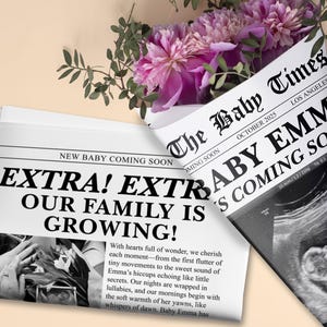 May include: A newspaper-style announcement with the headline "EXTRA! OUR FAMILY IS GROWING!" and the text "The Baby Times" with the name "EMMA" and an ultrasound image. A bouquet of pink flowers is wrapped in newspaper.