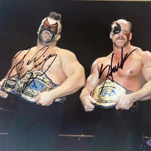 アニマル＆ホーク ザ・ロード・ウォリアーズ サイン入り WWE 8x10 写真