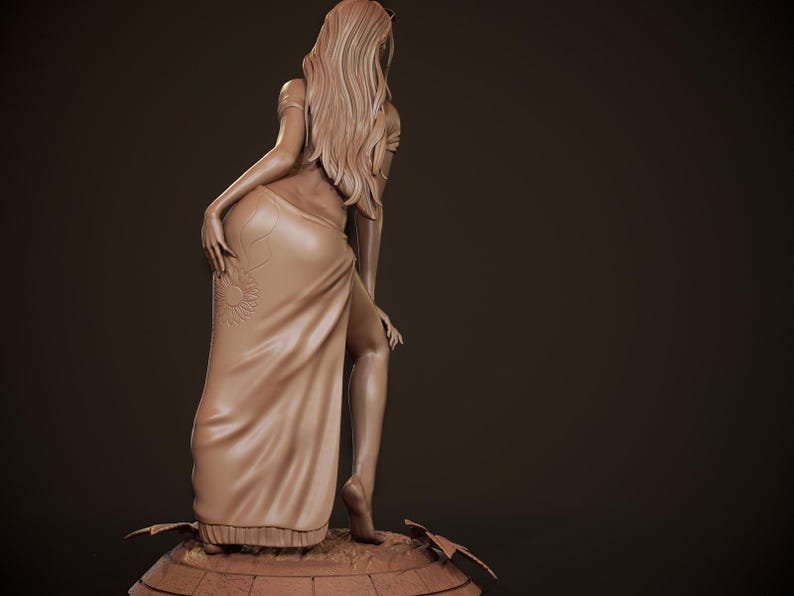 May include: A clay sculpture of a woman wearing a long, flowing dress with a floral design. The dress is split up the side, revealing one leg. The woman's hair is long and flowing, and she is standing on a base.