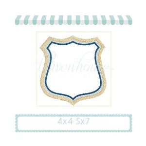 May include: A gold and blue embroidered shield with a white center. The shield is 4 inches by 4 inches and 5 inches by 7 inches.