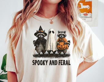 Spooky and Feral Raccoon Comfort Halloween Shirt, Funny Witch Animal Tee, Cute Creepy for Fall, Raccoon Witch Tee, Spooky Season Shirt