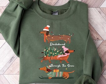 Sweat-shirt teckel dans la neige, haut de Noël drôle pour chien de compagnie