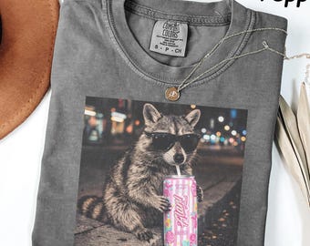 Comfort Colors® Raccoon Cotton Candy Drink Graphic Tee, Fun Animal Lover Shirt, Vintage Raccoons Shirt, Funny Meme Genz Dank Raccoons Shirt