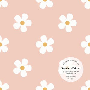 May include: A seamless pattern featuring white daisies with yellow centers on a light pink background. The pattern is 12 inches by 12 inches and is 300 DPI. It is available for commercial use.
