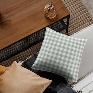 Cushion design using sage green gingham seamless pattern – muted green and white check digital fabric mockup