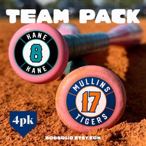 May include: Pink baseball bats with team logos. One bat features "KANE" and the number "8", the other says "MULLINS 17 TIGERS". The text "TEAM PACK" is at the top, and "4pk" is in the bottom left.
