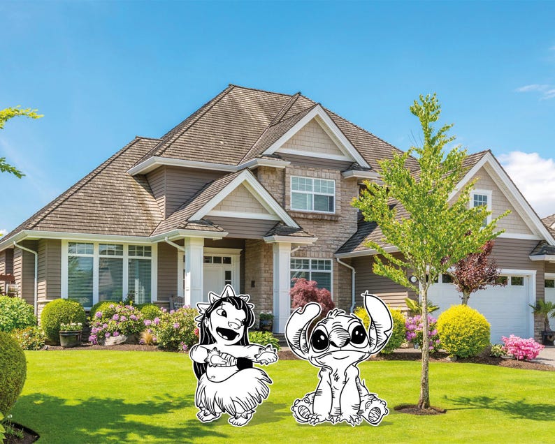 May include: Black and white cutouts of Disney characters Moana and Stitch are displayed on a green lawn in front of a house. The house has a brown roof, beige siding, and a white door. The sky is blue.
