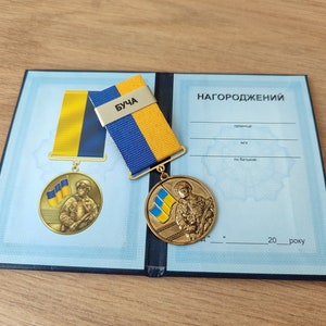 Medalla ucraniana "Por la defensa de la patria. Bucha" con diploma. Gloria a Ucrania