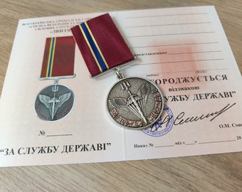 Medaglia delle truppe d'assalto aviotrasportate ucraine, "Per il servizio allo Stato" con documento