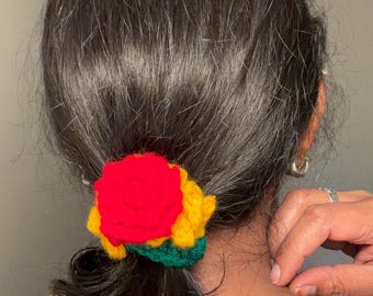 Crochet red rose scrunchie