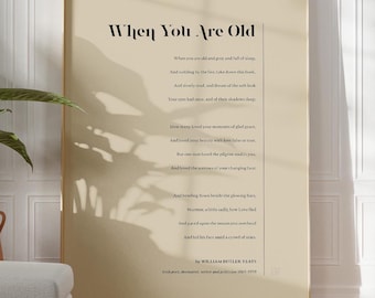 May include: A beige poster with a black frame featuring a poem titled "When You Are Old" by William Butler Yeats. The poem is written in a traditional style with a serif font.