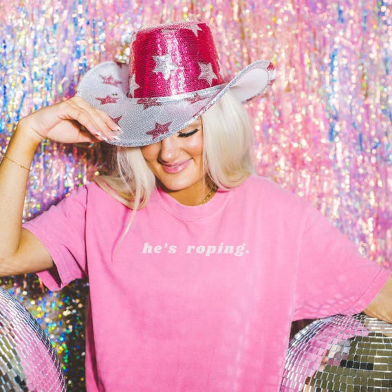 Comfort Colors® He's Roping T-Shirt, Funny Tee, Western Rodeo Shirt, Farmer Wants Country Humor, Ranch Life Apparel, Cowboy Rodeo Season Tee