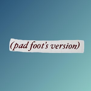 May include: A white piece of paper with the text "(pad foot's version)" written in maroon cursive.