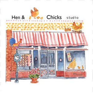 May include: Watercolor illustration of a shop with a red and white striped awning. The shop's name is "Hen & Chicks studio". A rooster sits atop a clock, and a hen and chicks are perched on the roof. A flower pot sits in front of the shop.