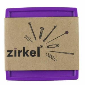 May include: A purple rectangular container with a brown paper wrap featuring the word "zirkel" and illustrations of various fasteners, including a nail, screw, bobby pin, and safety pin.