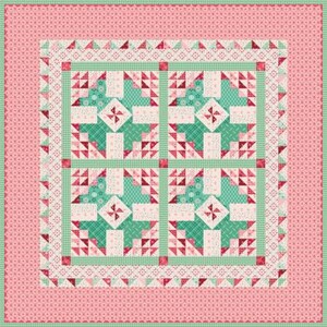 May include: A square quilt with a pink border and a central design in shades of green, white, and red. The quilt features geometric patterns, including squares, triangles, and floral motifs, creating a patchwork design. The overall aesthetic is a mix of traditional and modern quilting styles.