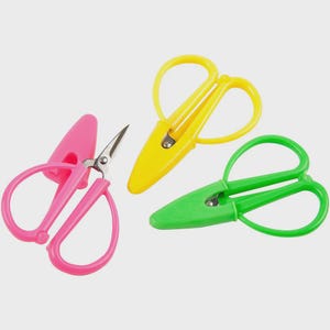 May include: Three pairs of colorful craft scissors. One pair is pink, one is yellow, and one is green. Each pair has a protective cover and is designed for precision cutting. The scissors are set against a plain background.
