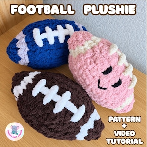May include: Three football plushies made of chunky yarn in dark blue, light pink, and dark brown. Each plushie features white stitched laces. The pink plushie has black embroidered eyes and a mouth. Text reads FOOTBALL PLUSHIE PATTERN + VIDEO TUTORIAL.