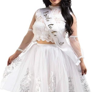 Bride-To-Be Bridal Shower Outfit Dress and Bachelorette Party 3 Pc Gift Set- Includes White Tutu, Mini Crown Tiara, and Bride to Be Sash Bride-To-Be Bridal Shower Outfit Dress and Bachelorette Party 3 Pc Gift Set- Includes White Tutu, Mini Crown Tiara, and Bride to Be Sash