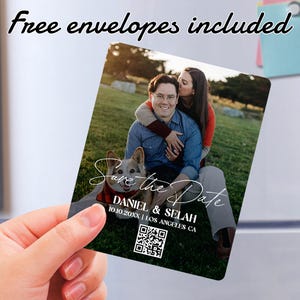 May include: Save the Date magnet with a photo of a couple and their dog. The magnet features the text "Save the Date", "Daniel & Selah", "10.10.20XX | Los Angeles, CA" and a QR code.