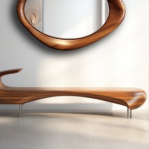 May include: A long, low-profile wooden bench with a smooth, curved silhouette and a polished finish, supported by thin metal legs. Above the bench hangs an oval-shaped wooden mirror with a thick, rounded frame that matches the bench's wood grain.