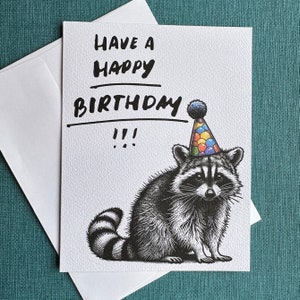 Cartão de feliz aniversário guaxinim