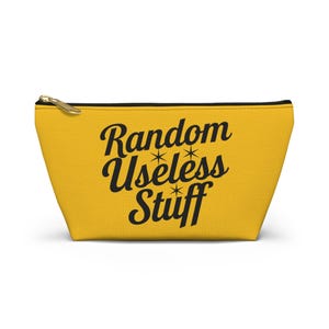May include: Yellow zippered pouch with black text that reads "Random Useless Stuff" with stars around the words.
