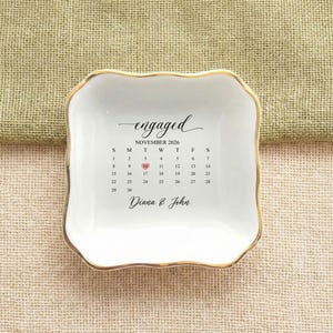 May include: A rustic wooden sign with the text "Welcome to our home" in white lettering. The sign features a distressed finish and a simple, inviting design, perfect for entryway decor.