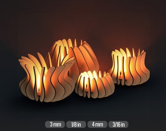 May include: Three wooden candle holders in the shape of stylized flowers. The holders are made of thin plywood and are illuminated from within, creating a warm glow. The holders are 3 mm (1/8 in), 4 mm (3/16 in) in thickness.
