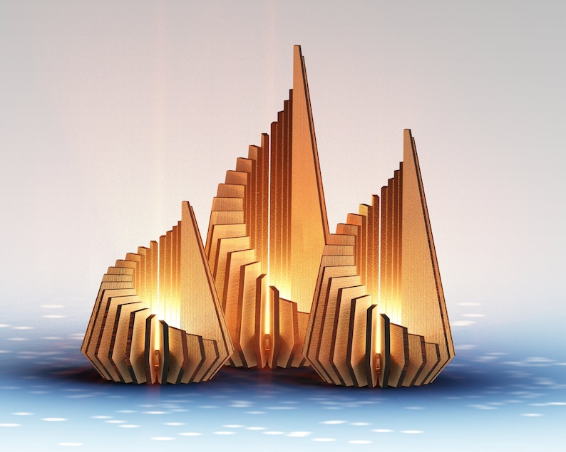 May include: Three wooden candle holders in the shape of abstract geometric structures. The candle holders are made of thin strips of wood that are stacked and interlocked to create a unique and modern design. The candle holders are lit and glowing, casting a warm and inviting light.